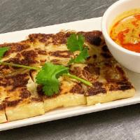 Murtabak Pancake · with ground beef, potatoes and served with curry dips