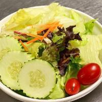 Mixed Green Salad · Lettuce, cucumber, tomato and radish with ginger plum dressing.