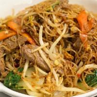 Mee Hoon Goreng · Thin rice noodles with bean sprouts, carrots, scallions, eggs, fried shallots, onions and ka...