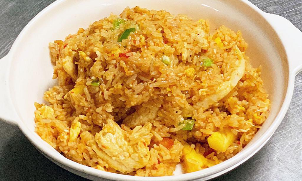 Thai Pineapple Fried Rice · Eggs, pineapple, onions and peas, carrots in soy and homemade sweet chili sauce.