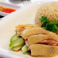 Steamed Hainanese Chicken (with Bones) · Garlic, chili sauce, sesame oil, soy sauce, hakka cilantro and served with chicken-flavored ...