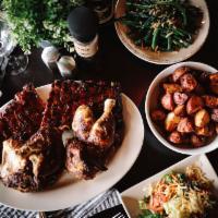 Rib and Chicken Combo Family · Two 1/2 racks with BBQ, 1 whole signature rotisserie chicken, house salad with choice of dre...