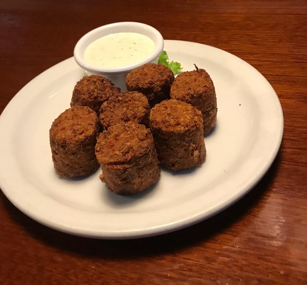 Tater Kegs · Jumbo tater tots stuffed with bacon and cheddar cheese, served with side of ranch dressing.