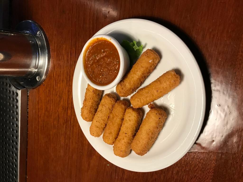 Mozzarella Sticks · Mozzarella dipped in bread crumbs and fried. Served with homemade marinara sauce.