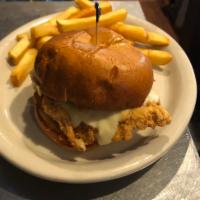 Honey Chicken Sandwich · Fried chicken breast topped with pepper jack cheese, honey, spicy mustard, and pickle chips....
