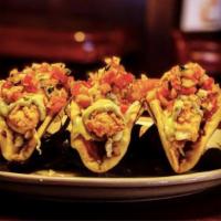 3 Fish Tacos · Fresh fried haddock served on caramelized onion naan with fresh pico de gallo looks
 and cab...