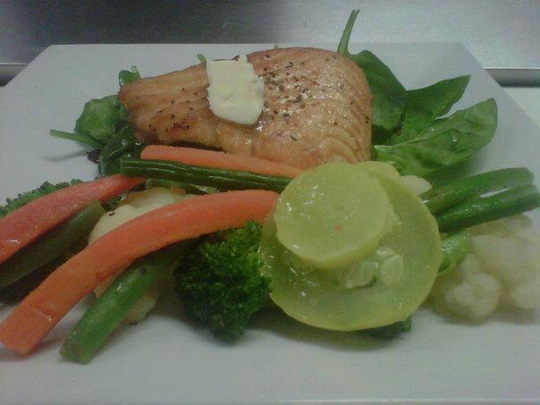 Salmon · 8 oz. of grilled salmon served on a bed of fresh spinach, almonds and dried red cherries with a lemon butter sauce, comes with one side dish.