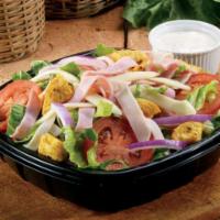 Italian Chef Salad Regular Size · Fresh-cut lettuce blend, ham, salami, provolone cheese, sliced tomatoes, red onions, and cro...