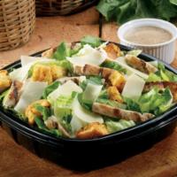 Chicken Caesar Salad · Fresh-cut lettuce blend, grilled chicken, Parmesan cheese and croutons made daily; served wi...