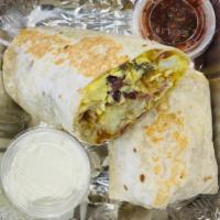 3 Meat Burrito · Scrambled eggs, hash browns, bacon, sausage, ham, cheddar, and jack cheese wrapped in a flou...