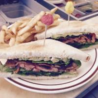 BLTA Sandwich · Bacon, lettuce, tomato, avocado, and mayonnaise, served on toasted sourdough.
