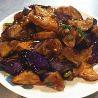 70. Eggplant with Tofu · Chinese eggplant with fried tofu and green onions stir fried in spicy Szechuan sauce. Hot an...