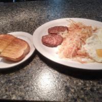 2 Eggs Any Style with Meat · Served with ham,bacon,, sausage link .