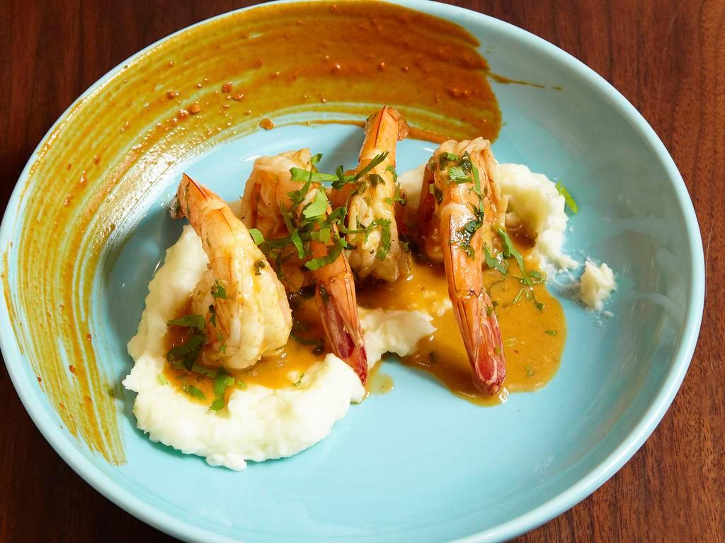 Camarones al Ajillo · Jumbo shrimp sauteed in garlic, guajillo and white wine served with mashed potatoes.