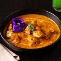 Murgh Makhni (Butter Chicken) · Boneless chicken, butter, tomato, and cashew sauce. Halal