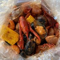 The Cajun Boil · 1/2 lb. crawfish, 1/2 lb. black mussels, 1/2 lb. head-of shrimp.