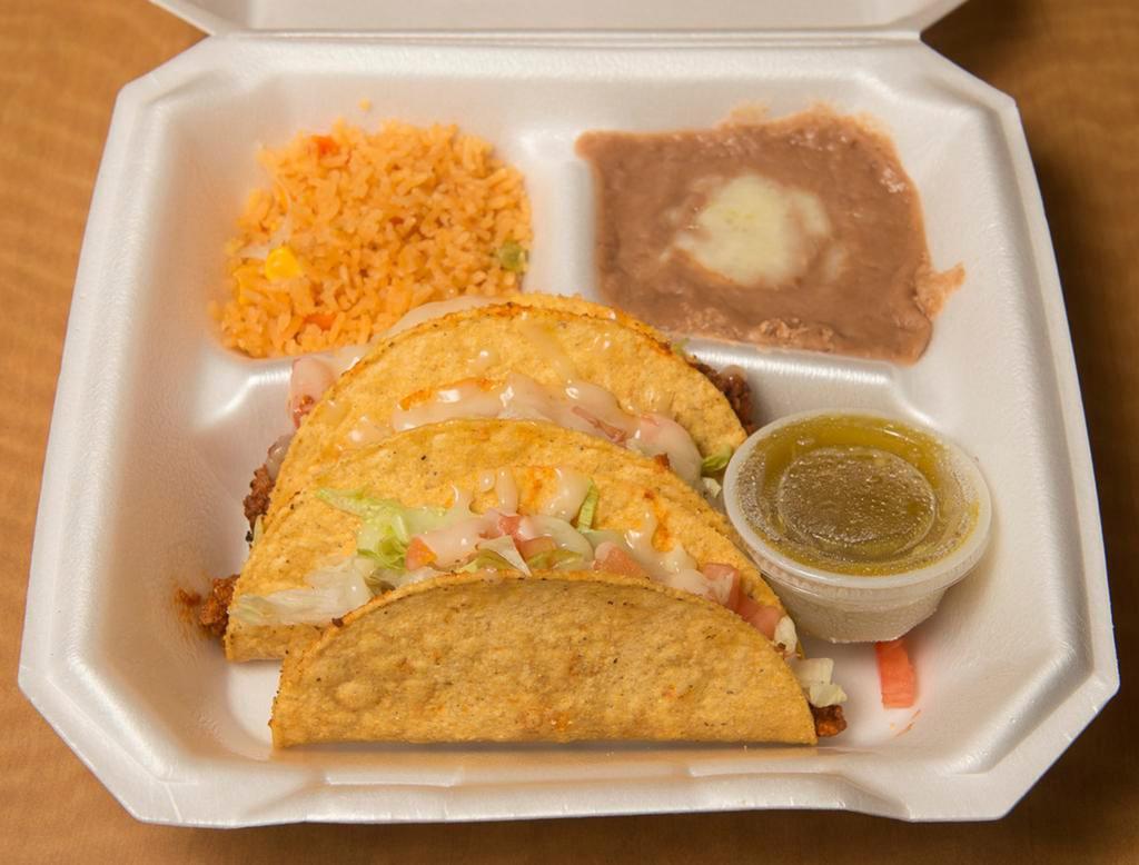 Taco Platter · 3 can be made with flour or corn tortillas (soft or hard) filled with your choice of ground beef, shredded beef or chicken topped with lettuce, tomatoes and cheese. Served with rice and beans.