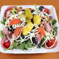 Italian Salad · Mixed greens, tomato, black olives, onion, ham, salami, pepperoni and pepperoncini peppers.