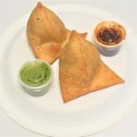 4. Vegetable Samosa · 2 pieces. Crispy turnover filled with potatoes and peas.