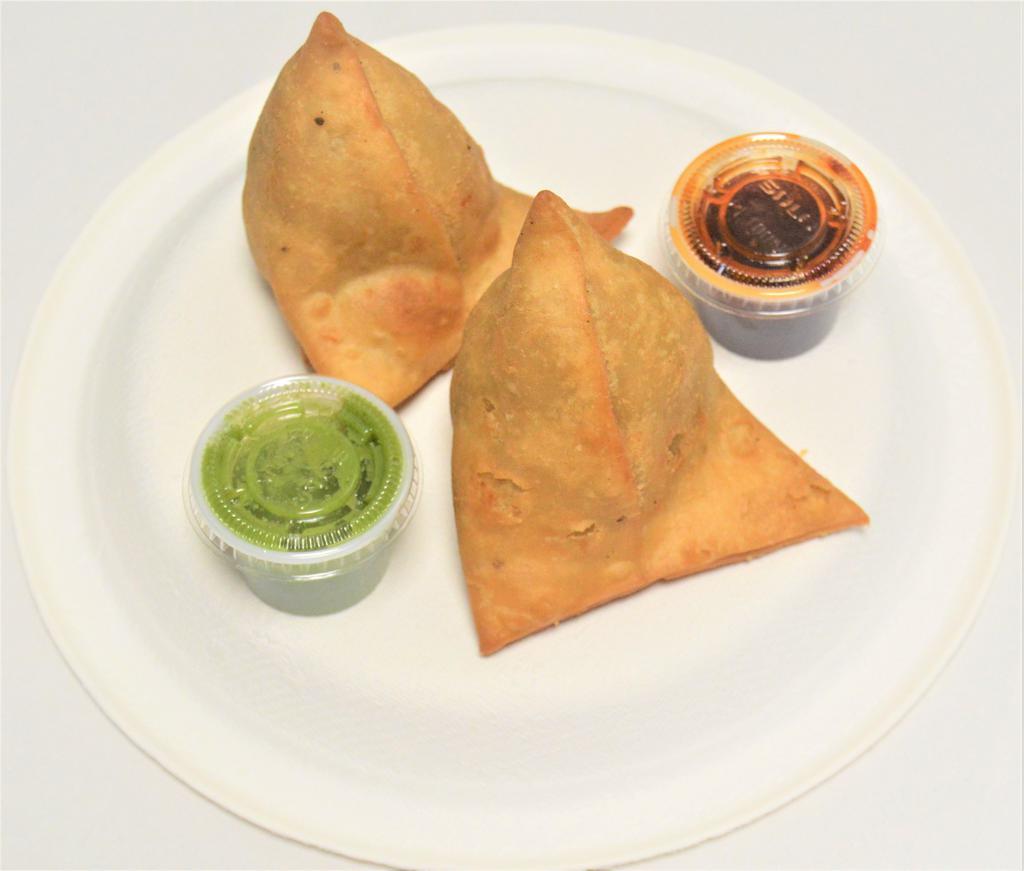 4. Vegetable Samosa · 2 pieces. Crispy turnover filled with potatoes and peas.