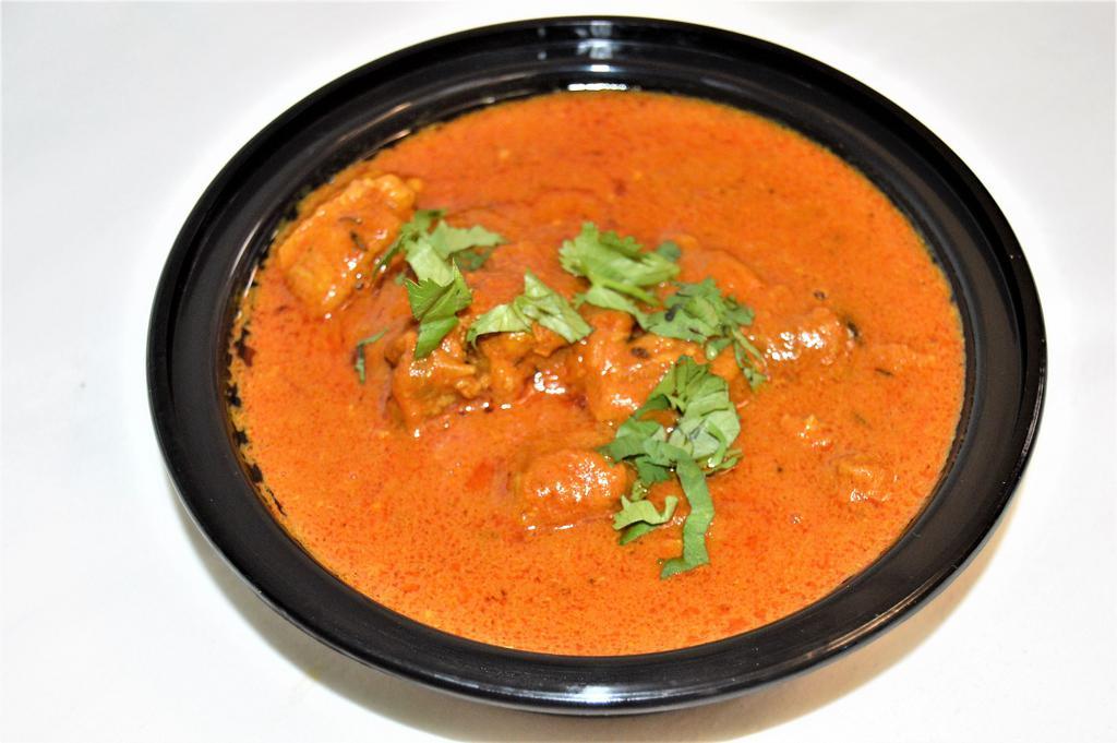 29. Lamb Curry · Cube of lamb cooked in traditional curry sauce. Served with rice.