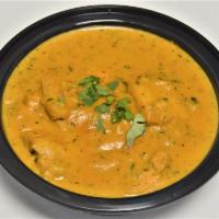 30. Lamb Korma · Cubes of lamb on a creamy mild sauce made from a mix of spices, almonds, nutmeg and cashews....