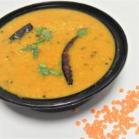 60. Daal Masoor · Yellow lentils sauteed with tomatoes, ginger, cumin, onions, garlic and exotic spices. Serve...