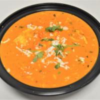 64. Shahi Paneer · Cheese with fresh tomato sauce and spices. Served with rice.