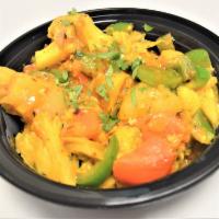 70. Aloo Gobi Masala · Cauliflower and potatoes cooked in delicate spices. Served with rice.