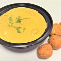 72. Malai Kofta · Vegetable balls cooked with nuts and mild spices. Served with rice.