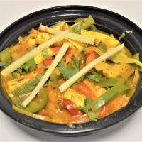 75. Paneer Jalfrezi · Paneer cooked with mild and tangy spices. Served with rice.