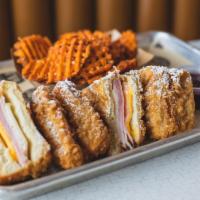 Full Monte · Batter dipped and fried sourdough with Swiss and American, smoked turkey and ham. Served wit...