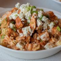 Buffalo Chicken Mac and Cheese · Curly pasta, cheddar cheese sauce, fried chicken, blue cheese crumbles and scallions, topped...
