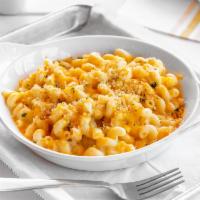 Four Cheese Mac and Cheese · Fontina, cheddar, Parmesan and American cheeses tossed with curly pasta and broiled with toa...