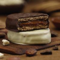 Alfajor · Alfajores are traditional BUTTERY COOKIES FILLED WITH DULCE DE LECHE. We BRING our Chocolate...