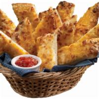 Cheesesticks · 12 piece. Our signature dough brushed with white garlic sauce and topped with cheddar, mozza...