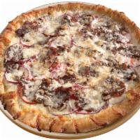 Philly Steak Pizza · A white garlic sauce base, steak, mushrooms, tomatoes, red onions, mozzarella and Pecorino R...
