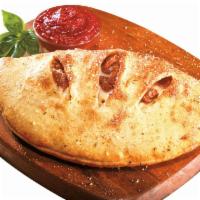 Spicy Italian Stromboli · Italian sausage, Genoa salami, pepperoni, capicola and ham baked with banana peppers and moz...