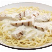Chicken Alfredo Pasta · A bed of pasta and grilled chicken strips in alfredo sauce and finished with Pecorino Romano...