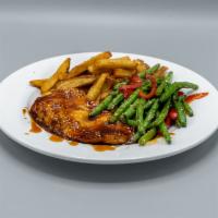 Sesame Chicken · Tender chicken breast glazed with teriyaki, sesame seeds served with mashed potato, and vegg...