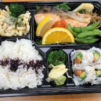 Issaquah Bento · Grilled salmon, 1/2 salmon and avocado roll, salad, cooked veggies, edamame, and tamago. Ser...