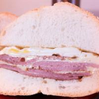 Egg Roll Sandwich · Fried egg, grilled Taylor pork roll & melted white American cheese.