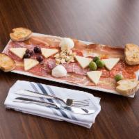 Antipasto-Misto · Assortment of Italian cured meats, cheeses, olives and nuts.
