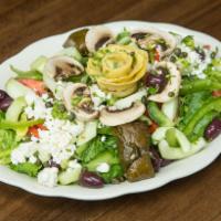 Garden Salad · Greens, tomatoes, mushrooms, cucumber, artichoke, black olives, capers, parsley, feta cheese...