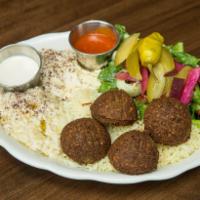 Falafel Platter · Fried croquette of chickpeas, onions and herbs.