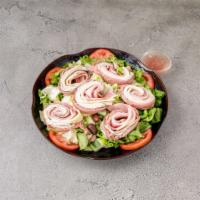 Chef's Salad · Mixed greens, julienne of turkey, ham, roast beef, Swiss cheese, and hard-boiled egg.