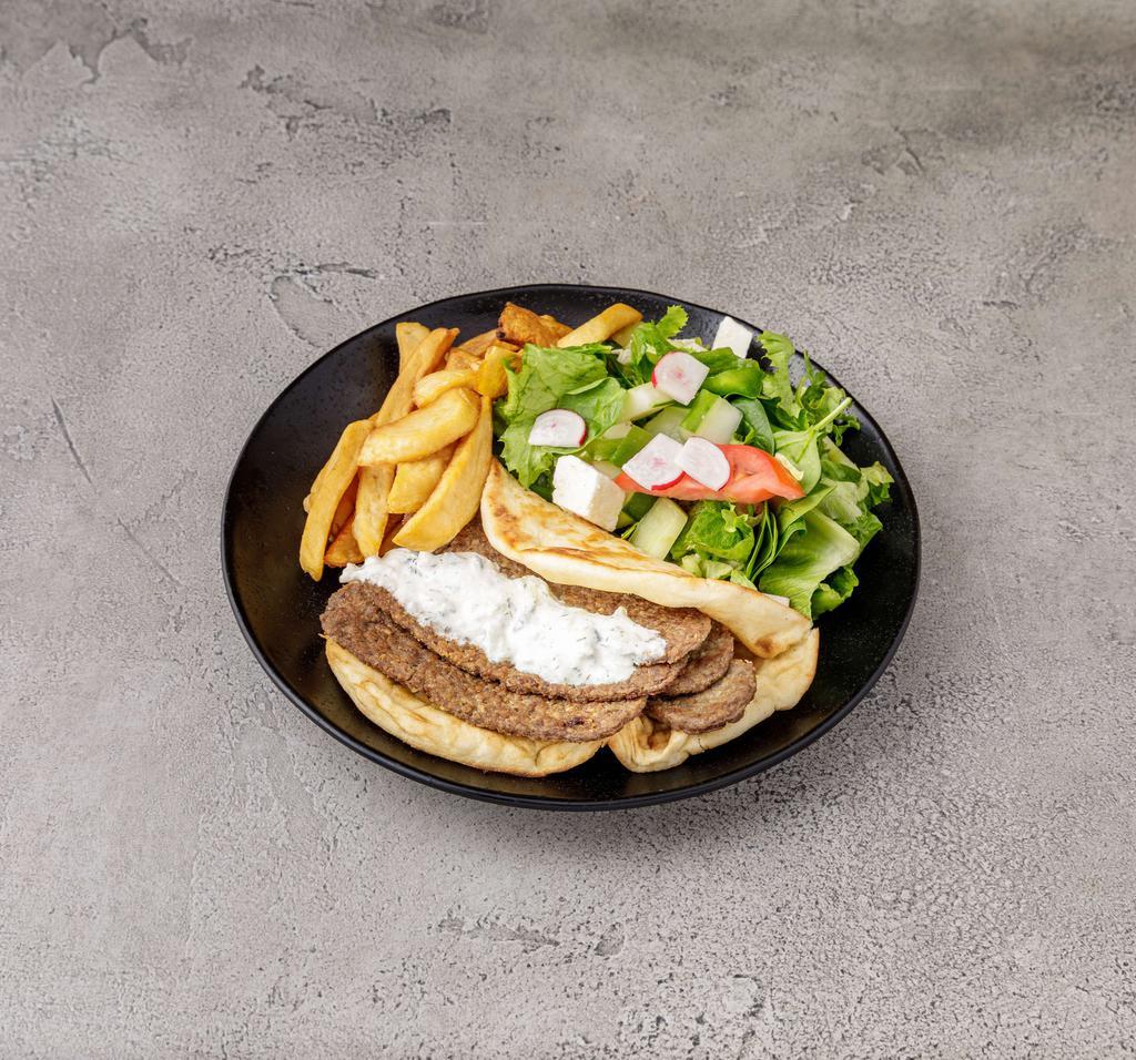 Open Gyro or Chicken Gyro Deluxe · Served with tzatziki sauce, Greek salad & french fries.