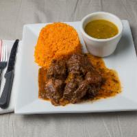 Chivo Guisado, Arroz y Habichuela Domingo & Miercoles Especial · Goat stew, rice and beans. Sunday & Wednesday.