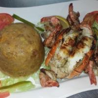Mofongo de Langosta y Camarones · Mofongo with shrimp and lobster.