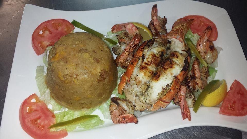 Mofongo de Langosta y Camarones · Mofongo with shrimp and lobster.